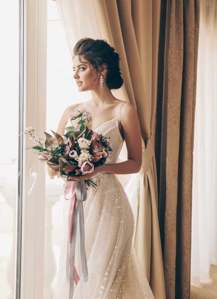 beautiful bride in luxurious wedding dress